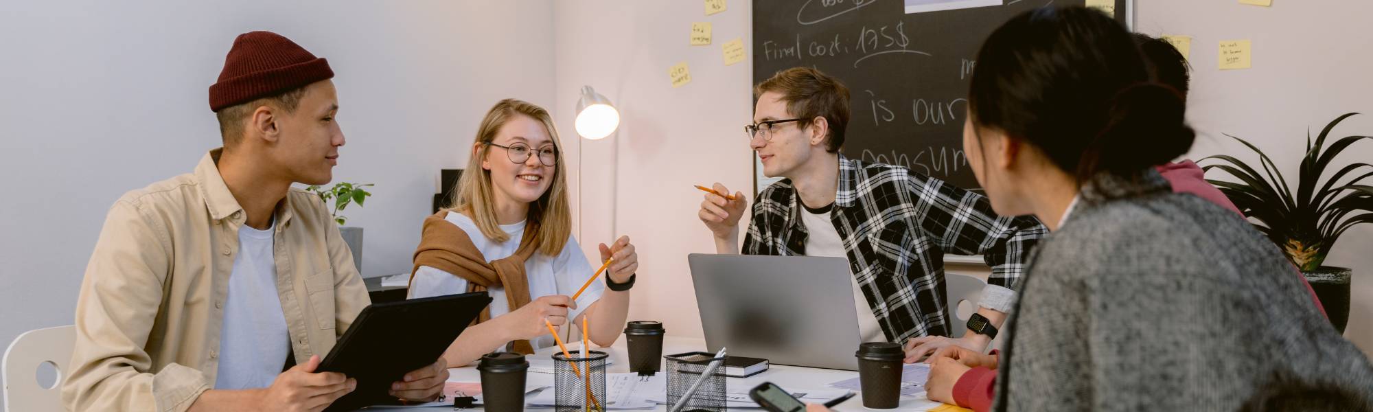 Students Meeting around a table